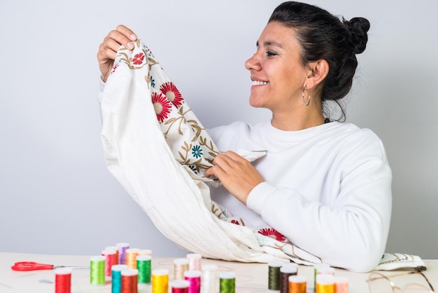 Artist sewing colorful pattern